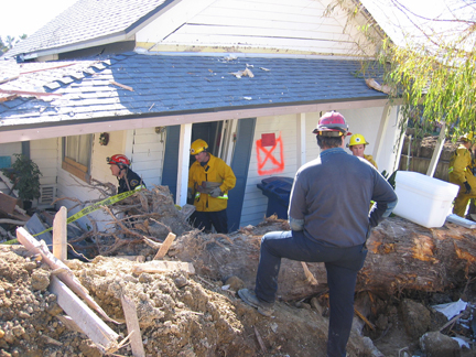 Photo of home damaged after a landslide in California. FEMA file photo.
