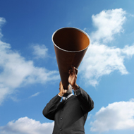 Photo of a man on a megaphone